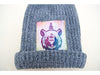 Knit winter hat with Bearicorn Design wearing ski goggles